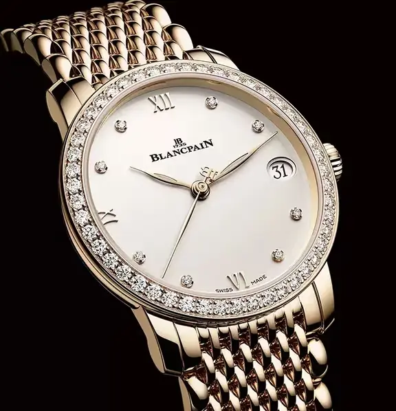 Blancpain diamond-set gold watch on a black ground, from the private book